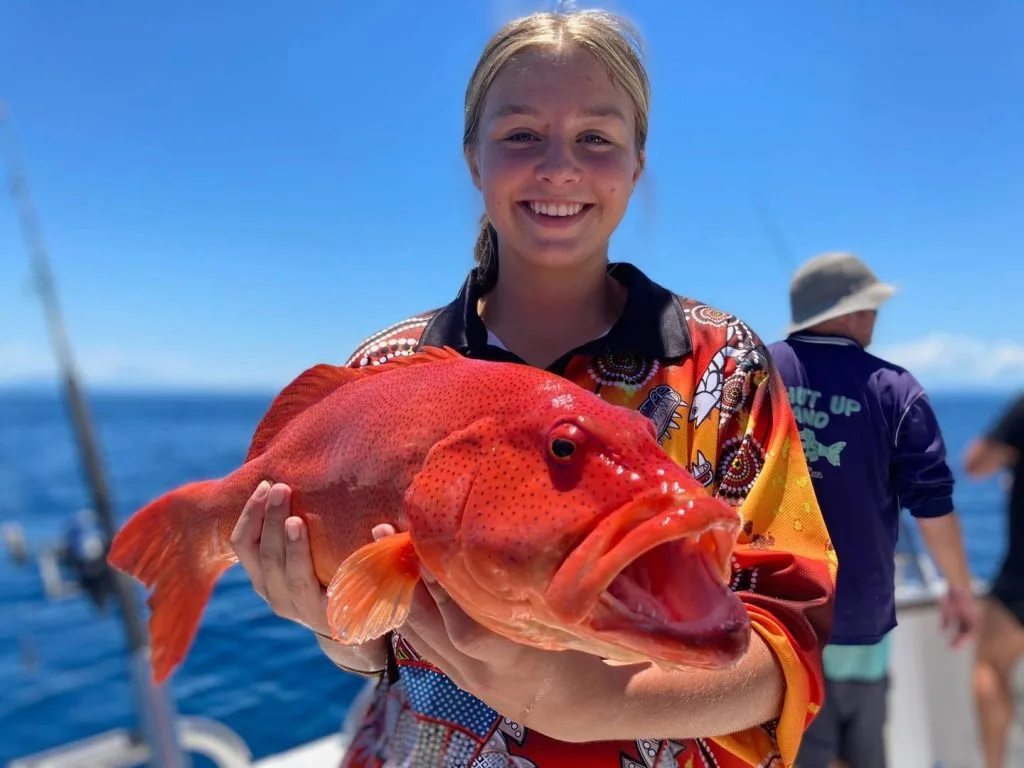 girl-holding-fish